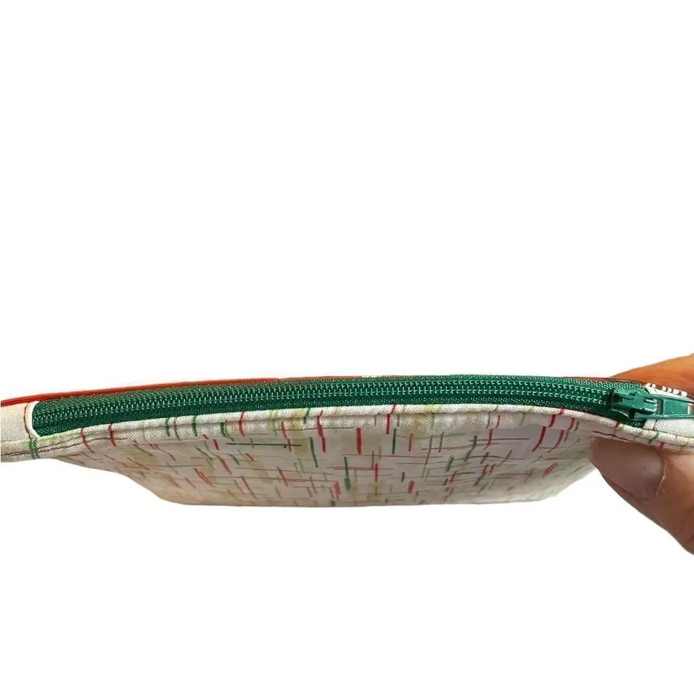 HANDCRAFTED M&M CLUTCH‎